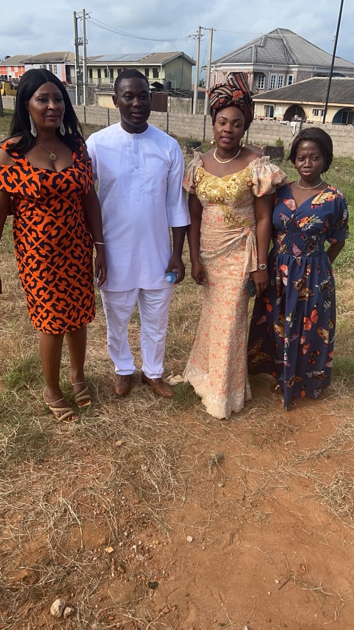 Four Command Ojo classmates outdoors in formal and traditional attire