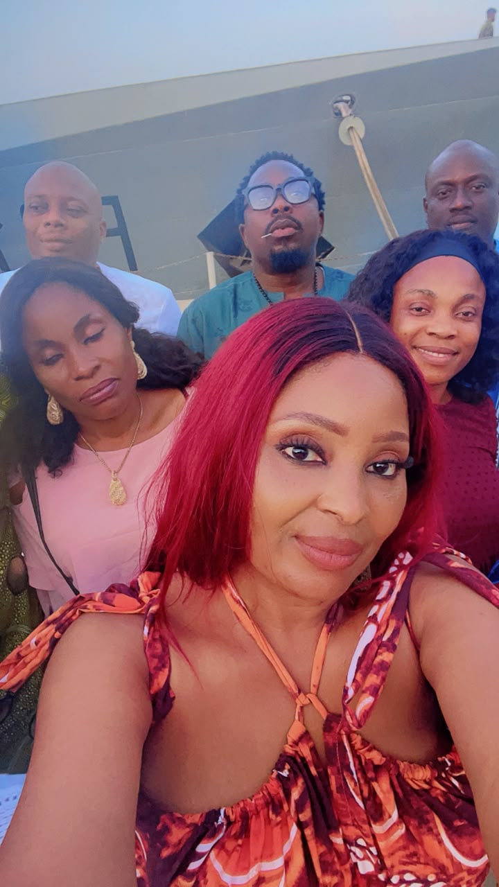 Command Ojo classmates posing for a group selfie outdoors